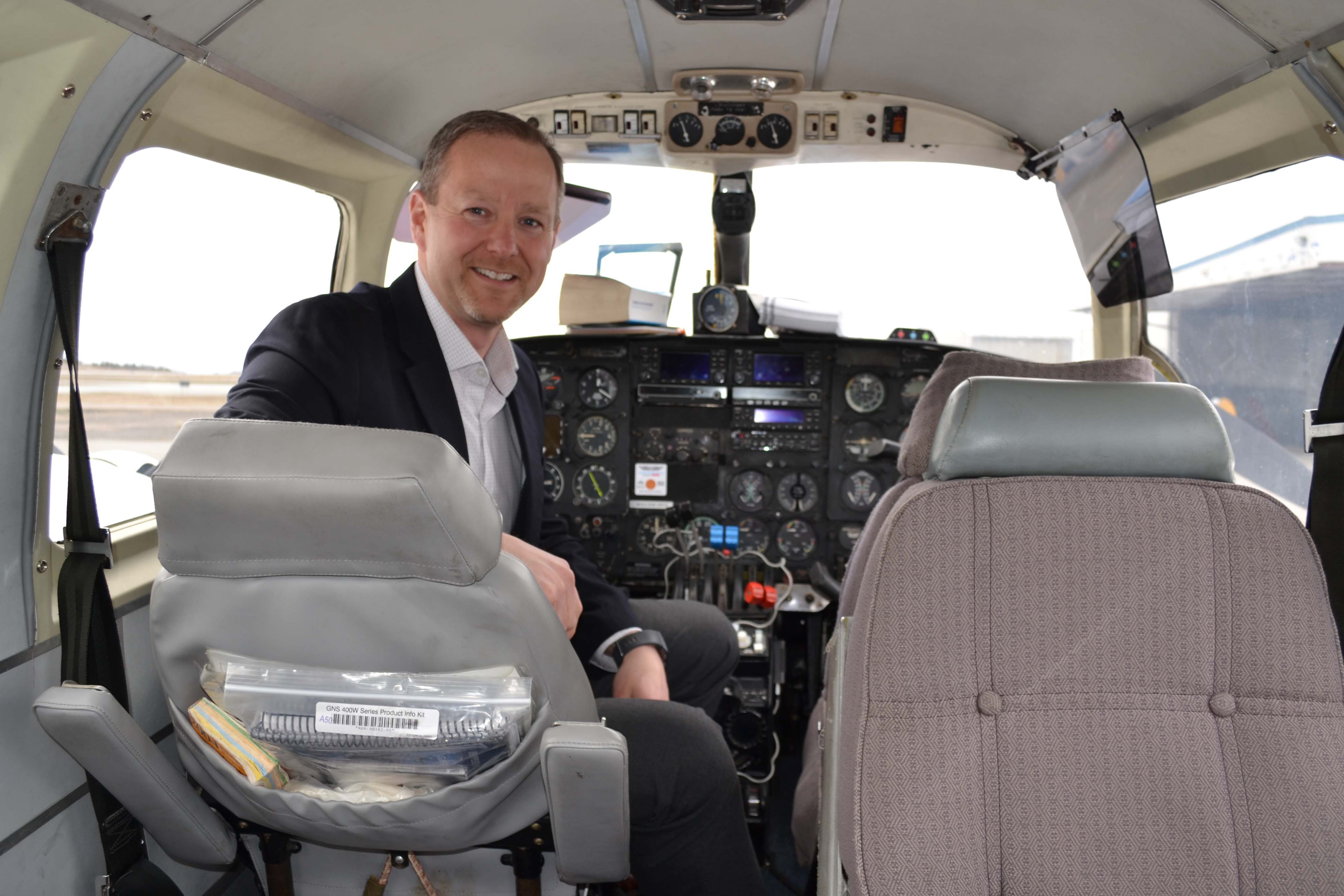 Ryan Mitchell, VP of Saint John Energy, aboard a small aircraft used for MyHEAT's data collection
