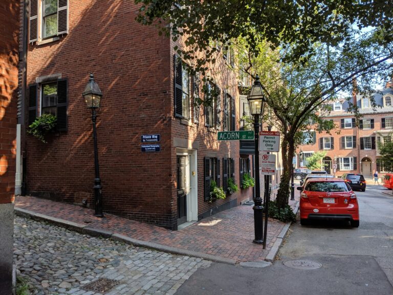 brick building on cobblestone street